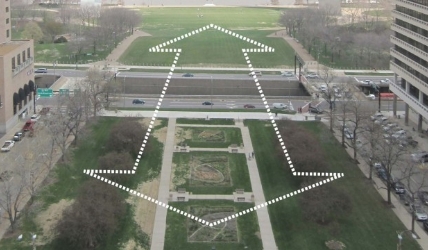 A view of the plans for Gateway Arch National Park's latest updates. The arrow above both areas of grass shows where the greenway will be placed.